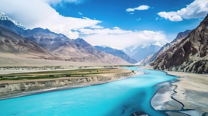Scenic view of the Indus River, a historic waterway flowing through Pakistan and India, featuring calm waters, fertile riverbanks, traditional boats, rural villages, and lush vegetation