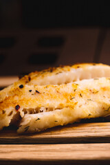 Fish fillet cooked with spices. Healthy living concept.
