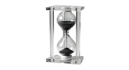 Time runs in a modern, clear glass hourglass with black sand on a black background. For concepts about deadlines, time management, productivity.