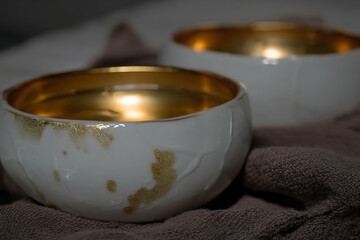 Obraz premium candles in a glass bowl
