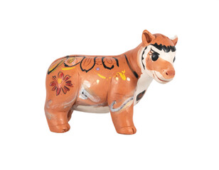 Charming folk art clay figurine of a brightly painted tiger with floral designs