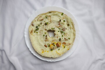 The perfect blend of crispy, sweet, and creamy ghewar