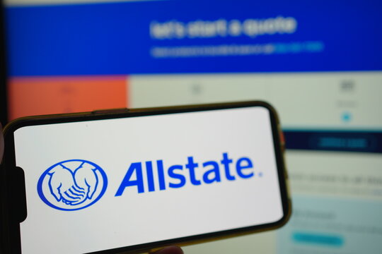 Roosendaal, The Netherlands - August 02, 2025: A mobile phone displaying the company logo of Allstate, with the company website in the background.