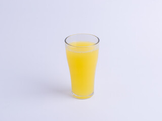 A glass of fresh orange juice on a white background. Concepts for healthy drink, citrus, vitamin C, breakfast, beverage, refreshment, fresh, isolated, organic.

