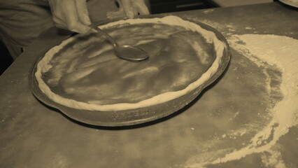 woman cooking pizza throwing pieces of meat on it product delicious house apartment holiday hand person