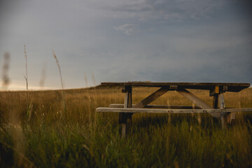 Fototapeta premium Picnic table at golden hour 