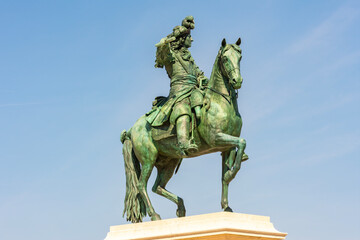 Obraz premium Monument to king Louis XIV at Versailles palace, Paris suburbs, France
