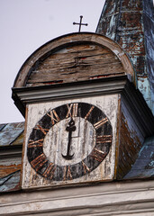 old clock on the roof of the church