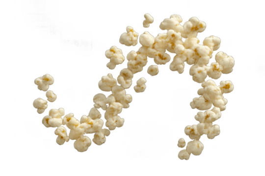 Popcorn kernels exploding and flying forming an s shape on transparent background