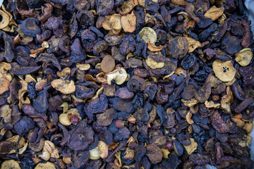 Dried fruits in a box. Sale of dried fruits at the market and store. Ingredients for uzvar from...