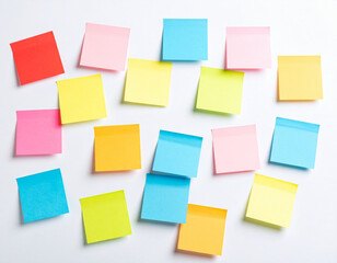 Collection of colorful blank sticky notes on white