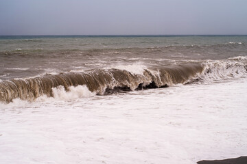 Storm on the Black Sea in winter, dark cloudy sky, seascape.