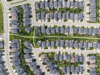 View of homes during the summer in Aspen Estates area of Calgary, Alberta.