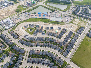 View of homes during the summer in Aspen Estates area of Calgary, Alberta.