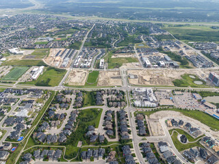 View of homes during the summer in Aspen Estates area of Calgary, Alberta.