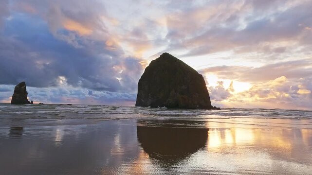 Sunset at Haystack Rock on Cannon Beach, Oregon looping