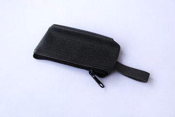Black leather purse. Black leather wallet isolated on white background , top view , flat lay.