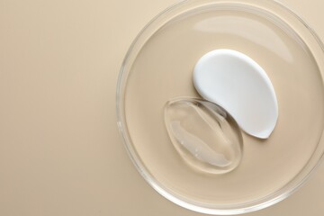 Different cosmetic products in Petri dish on beige background, top view. Space for text