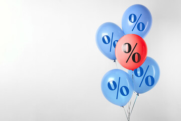 Balloons with percent signs against light background. Hot sale, special offer