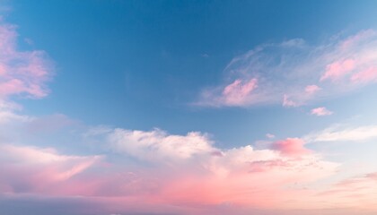 Obraz premium a soft pastel sky with a blend of white light blue and pink creating a dreamy and ethereal atmosphere