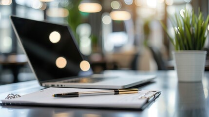 Modern Office Desk with Laptop, Notebook and Pen, Bright Natural Light