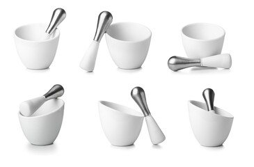Set of mortar and pestle on white background