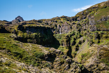 Mountain Landscape with Waterfall in Rugged Terrain