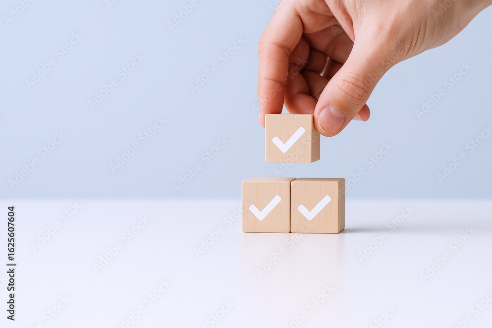 Poster Hand placing wooden cube with checkmark to form stack symbolizing completion and approval