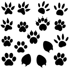 Collection of black animal paw prints and footprints silhouette isolated on transparent background