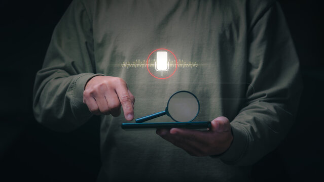 Concept of effective use of voice search technology, the businessman is using his voice to command AI to search information on the internet, big data, and automation