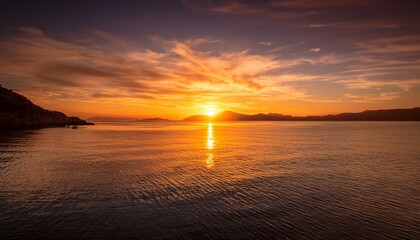 Naklejka premium a serene sunset over calm waters blending warm hues of orange and yellow