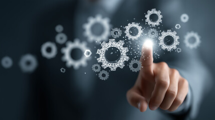 Businessman hand finger  touch floating digital gear symbolize connection between technology industry.