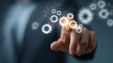 Businessman hand finger  touch floating digital gear symbolize connection between technology industry.