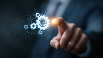 Businessman hand finger  touch floating digital gear symbolize connection between technology industry.