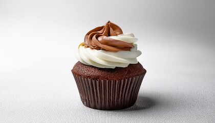 moist chocolate cupcake with creamy white filling on a white background