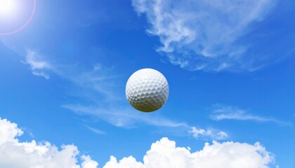 ゴルフボール  ディンプル  青空 雲 スポーツ 屋外 レジャー 晴天 白  精密 準備 質感 明るい 清潔 透明感 静止 丸 夏