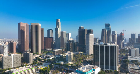 Naklejka premium Los Angeles city. LA downtown aerial view. Los Angeles skyline. LA panorama. Los Angeles from a top view. Downtown towers of Los Angeles. Panoramic scene of LA skyline. American city in California.