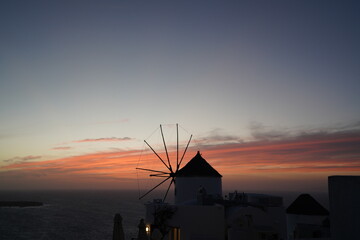 Fototapeta premium Beautiful sunset in Santorini Greece