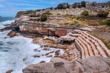 The Waverley Cemetery is a heritage-listed cemetery on top of the cliffs at Bronte. Opened in 1877....