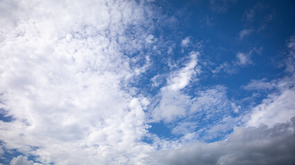 Beautiful cloud patterns in a bright blue sky