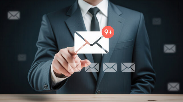 Professional businessman interacting with digital inbox notifications, managing incoming messages and communication in modern business setting
