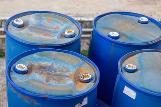 Blue industrial plastic drums for liquid storage