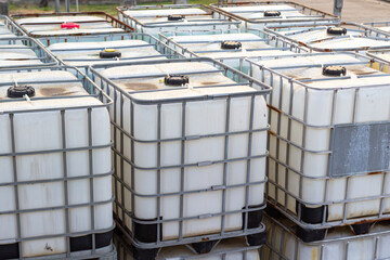 Rows of Intermediate Bulk Containers in an Industrial Setting