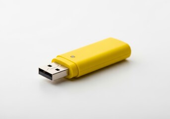 Yellow USB Flash Drive on White Background - A vibrant yellow USB flash drive rests on a clean white surface, symbolizing data storage, portability, technology, transfer, and memory