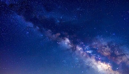 Fototapeta premium Wide night sky reveals bright cluster of distant stars.