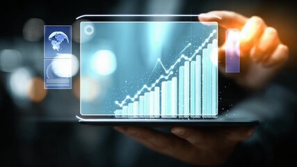 A hand holds a device displaying a projected financial chart with growing bars and a line graph. Additional graphic elements are included - Powered by Adobe