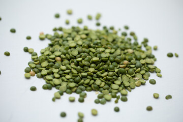 green split peas on white background in the center