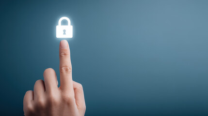 Glowing lock icon on fingertip symbolizes data protection measures in digital context