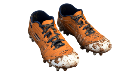 Cleats covered in mud after an intense game on the field