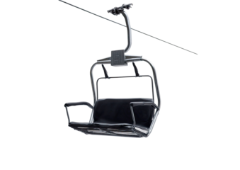 Empty ski lift chair suspended on cable